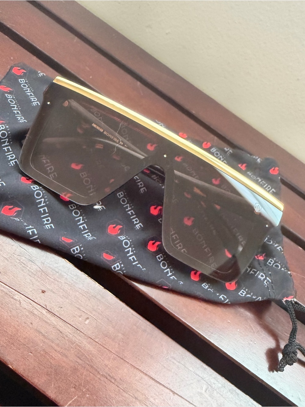 Women’s Bonfire Black Shield Sunglasses with Gold Accent